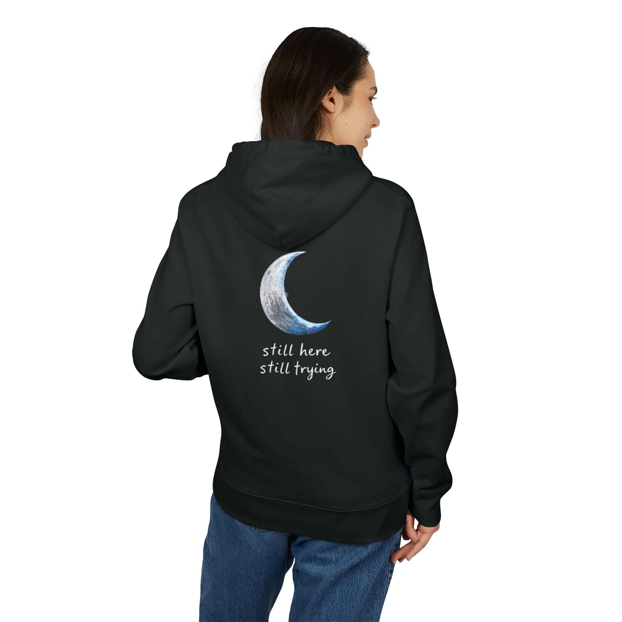 Model wearing Black Pullover Nation Still Here Still Trying Hoodie back view